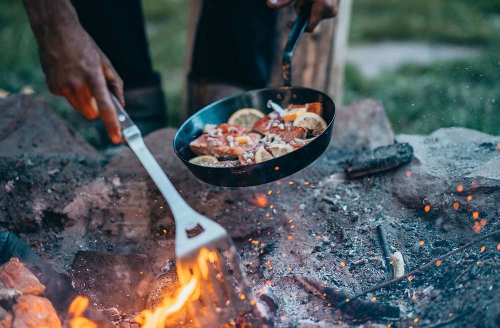 Cooking Over Fire: How to Use Carbon Steel Pans Outdoors